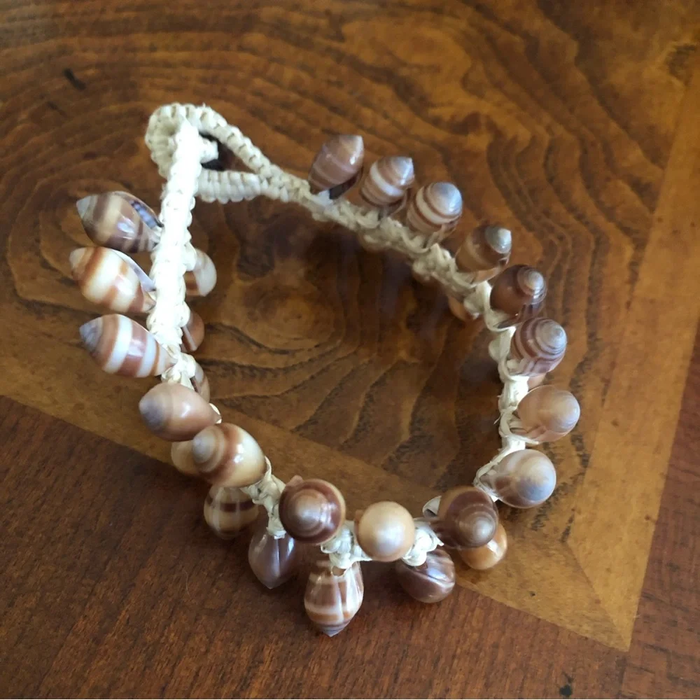 Handcrafted boho resin coated shell braided bracelet